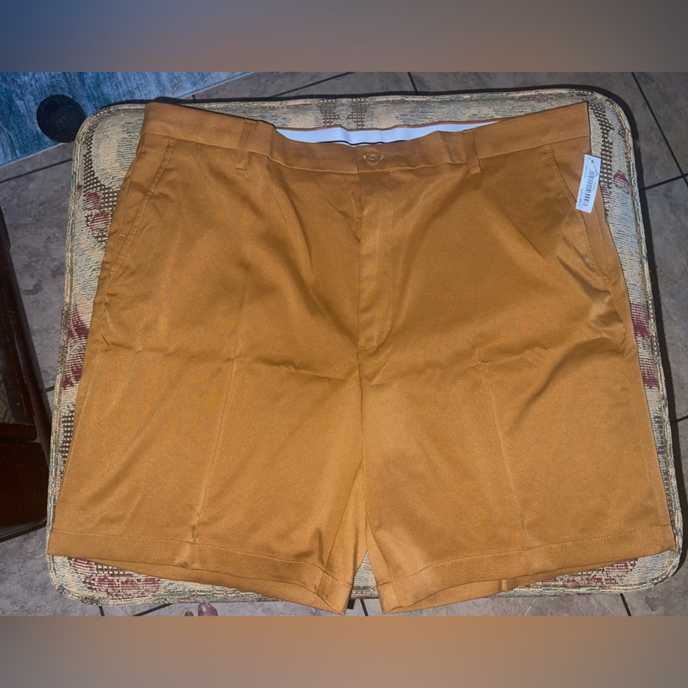 New with tags, Amazon essentials men’s shorts color is nutmeg size 42